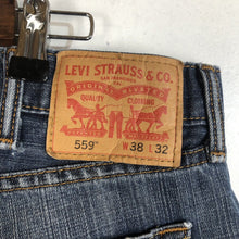 Load image into Gallery viewer, Levis 559 Jeans Men’s Size 38W 32L Medium Wash Red Tag (Some Distressing)